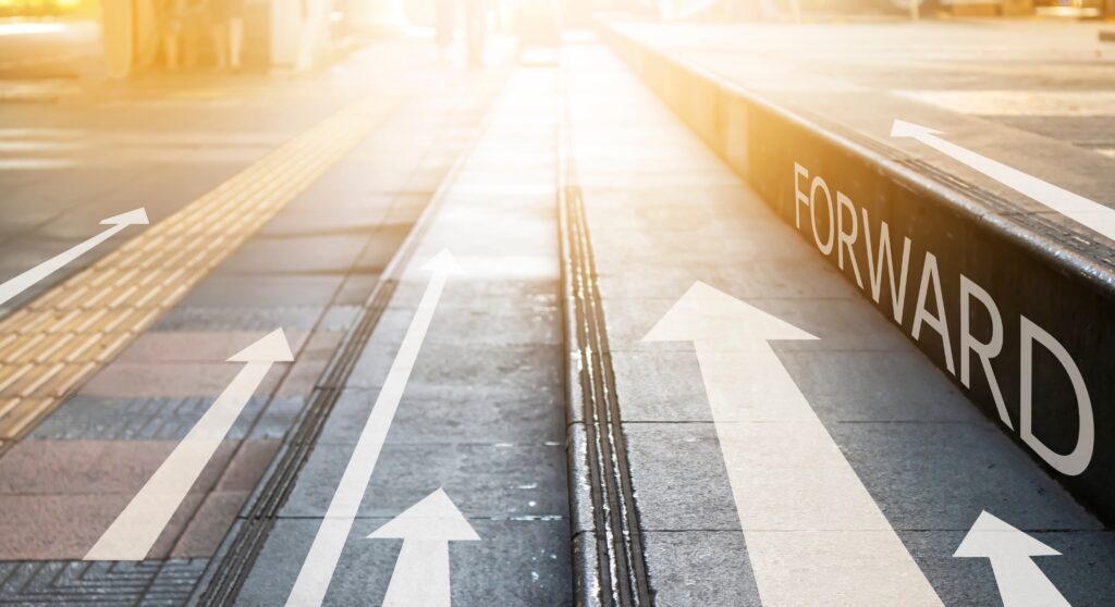 A street with arrows pointing in different directions.